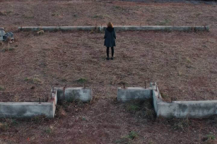 Wanda alone in empty lot