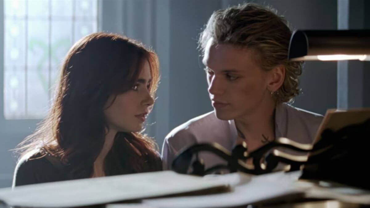 clary and jace in the mortal instruments sitting at the piano