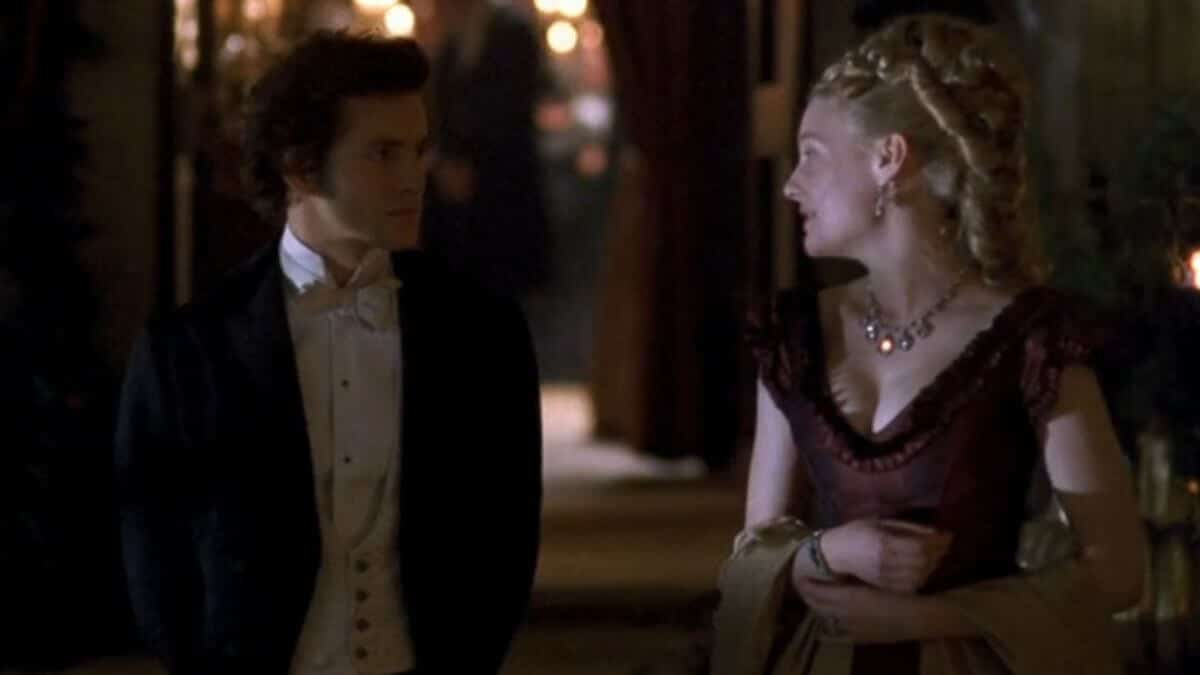 Daniel Deronda and Gwendolen look at each other.