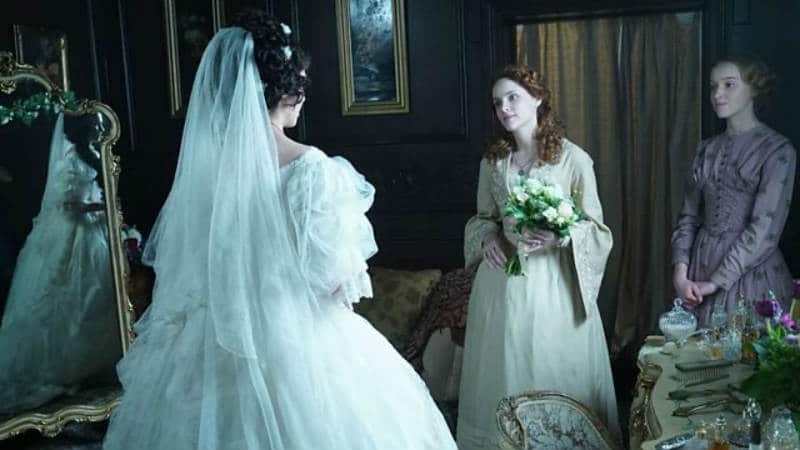 Amelia Havisham (Tuppence Middlton) prepares for her wedding day with her friend, Honoria Barbary (Sophie Rundle). Dickensian.