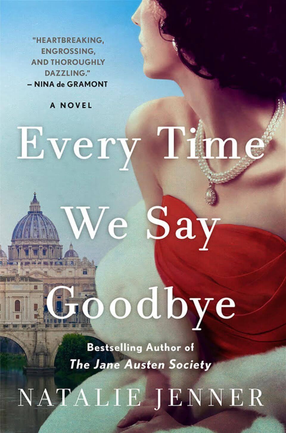 Every Time We Say Goodbye Book Cover. The book cover has a woman wearing a glamorous 1950s dress and an old building in the background. The book is by Natalie Jenner.