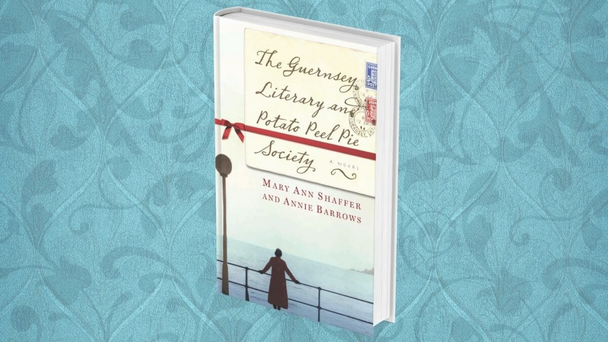 The Guernsey Literary and Potato Peel Pie Society book club pick; The image has the book cover and a blue Victorian background.