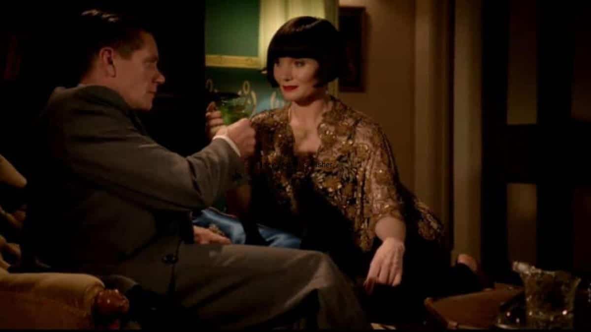 Jack and Miss Fisher share a martini.