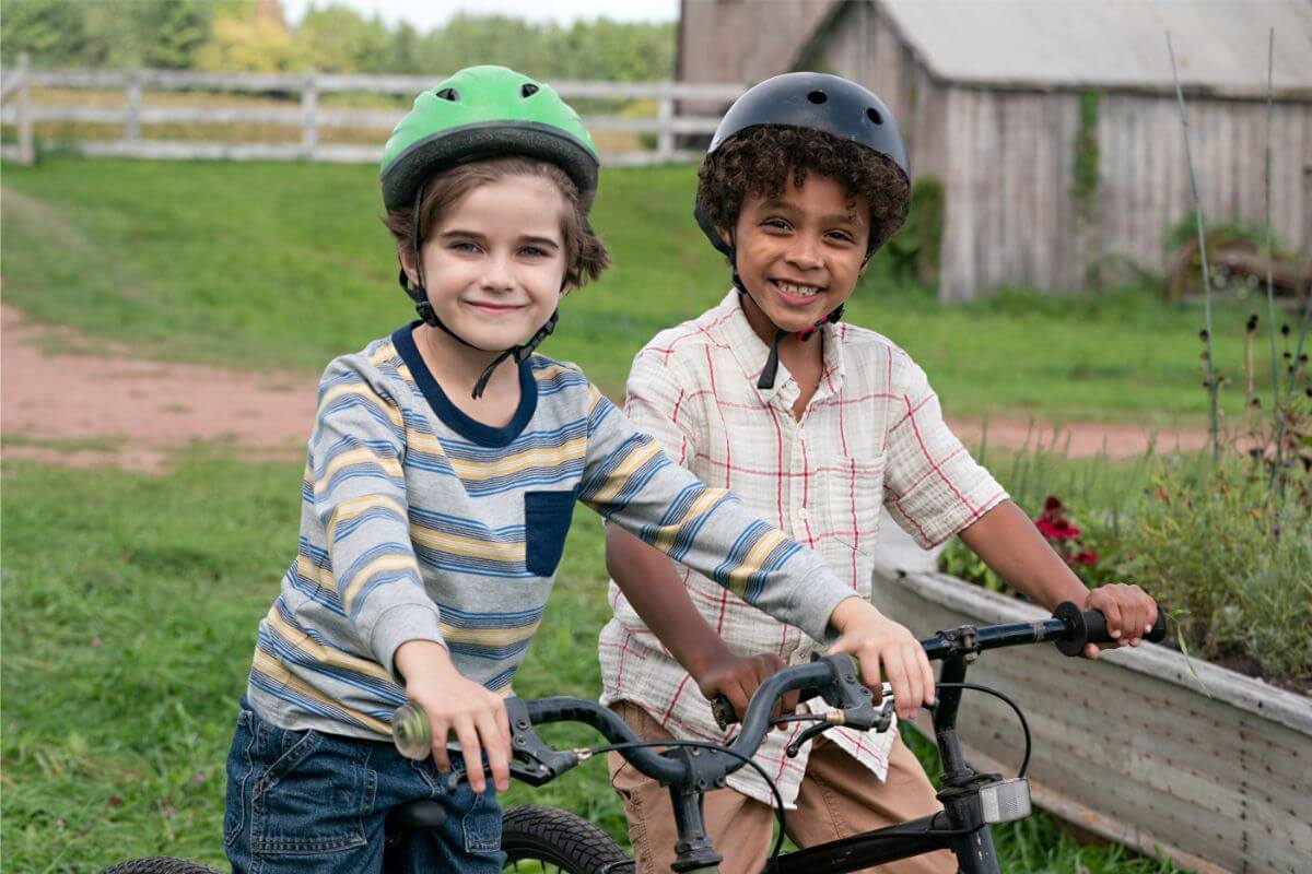 Jacob in The Way Home with a friend. The two boys are on bikes.