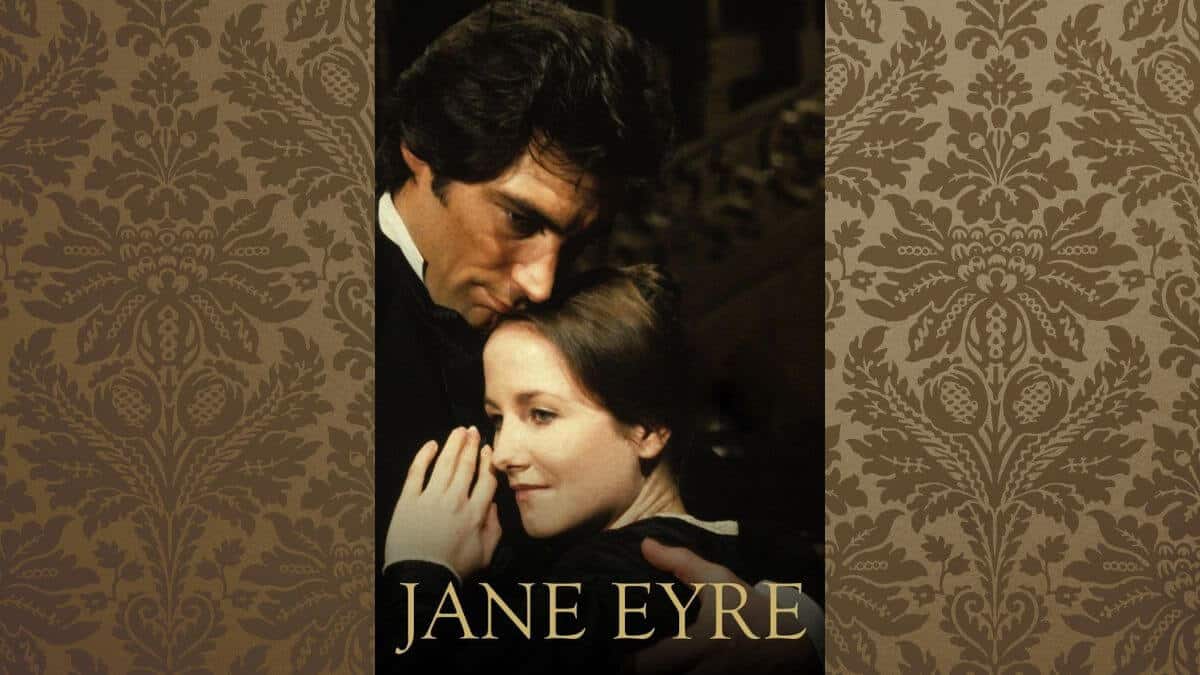 Jane Eyre 1983 featured image showing a poster with Rochester and Jane in an embrace. Behind the poster is a Victorian background.