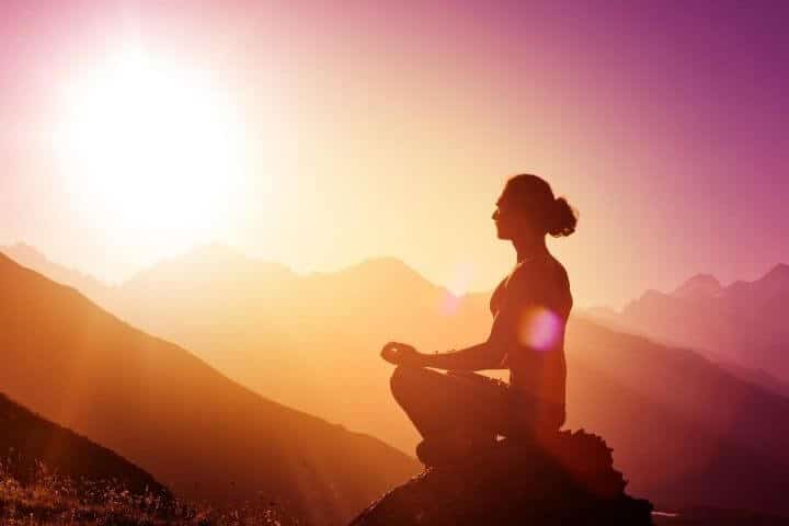 Morning Routine picture; meditating at sunrise