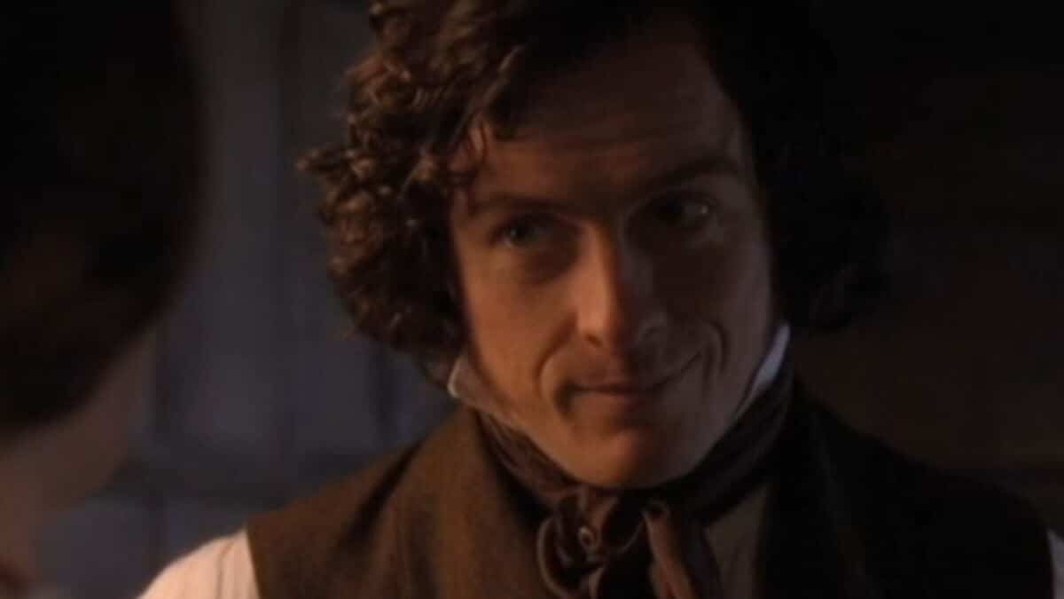 Mr. Rochester smiles at Jane.