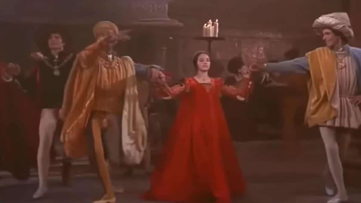 Juliet's red dress in Romeo and Juliet 1968 film. She's shown dancing.