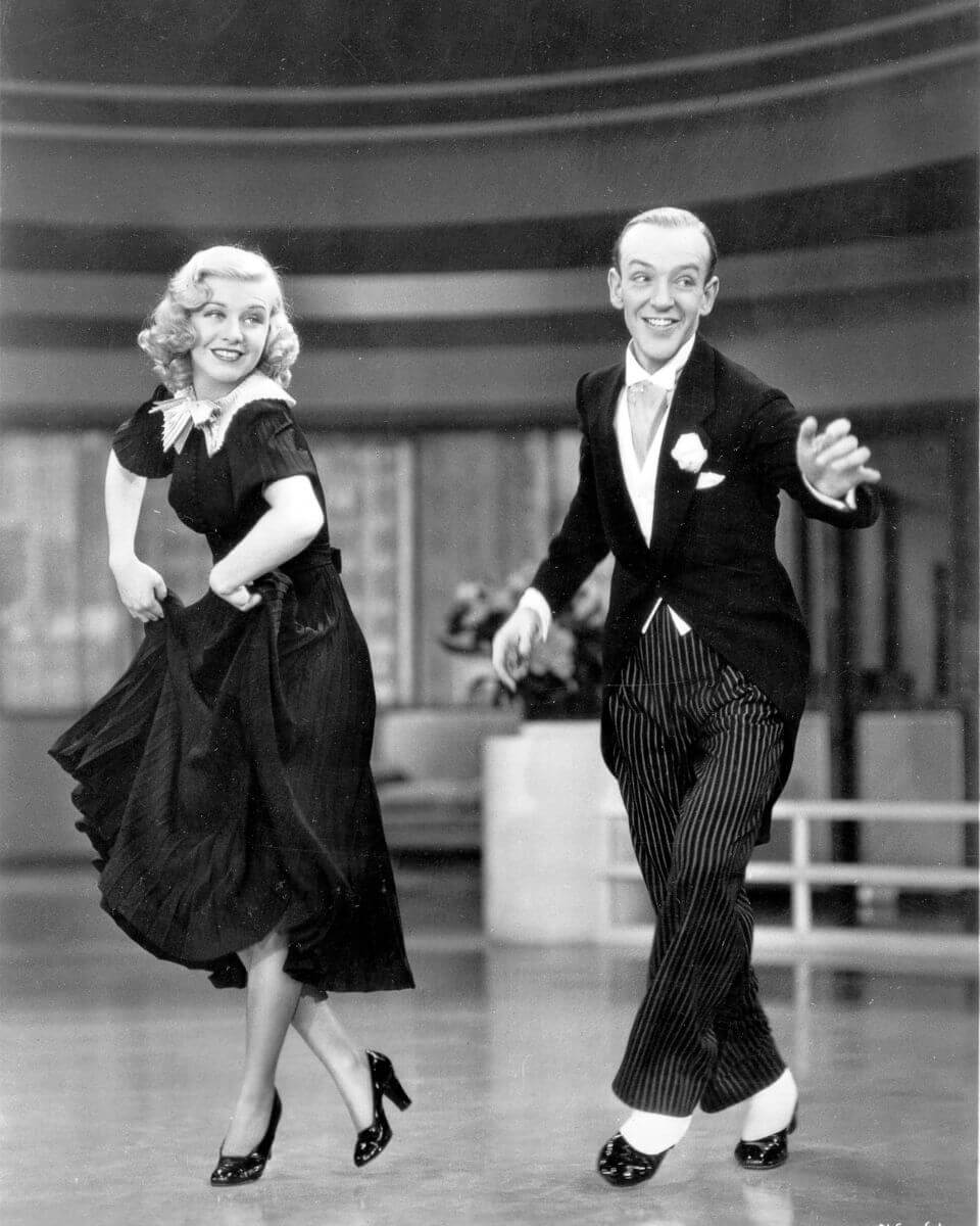 Swing Time still of Ginger Rogers and Fred Astaire dancing together.