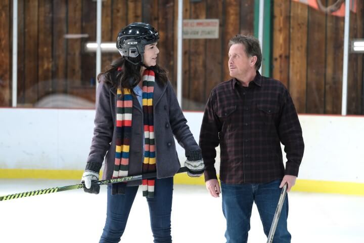 the mighty ducks game changers publicity still with Emilio Estevez and Lauren Graham