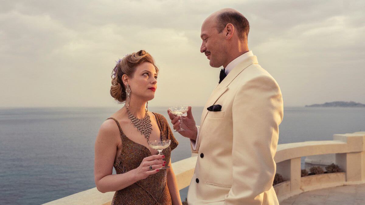 Transatlantic still with Gillian Jacobs and Corey Stoll