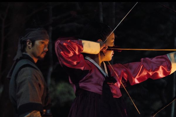 Ja-In practicing archery. Photo: Lotte Entertainment